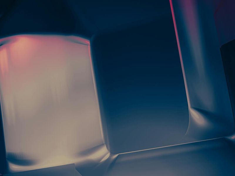 Person performing a smooth yoga transition on a dark background.